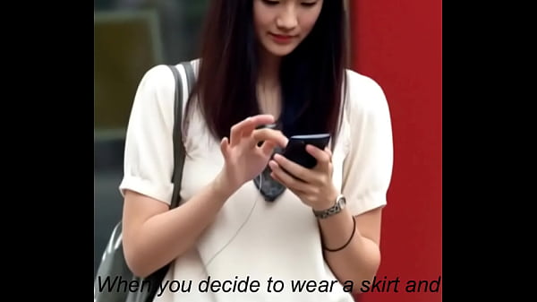 Attractive Chinese-looking woman got upskirt by the wind